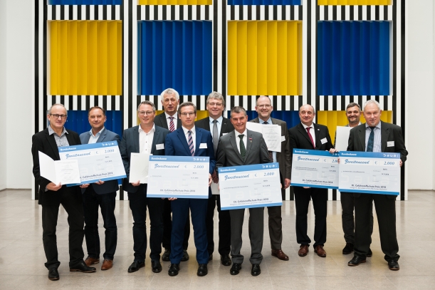Alle Preisträger des 12. Deutschen Gefahrstoffschutzpreises in der Halle des Volkes im BMAS in Berlin.